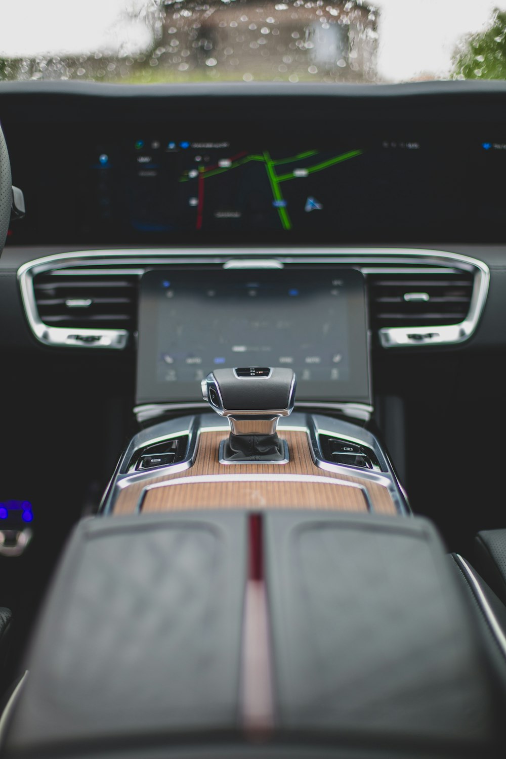 the dashboard of a car with a clock on it