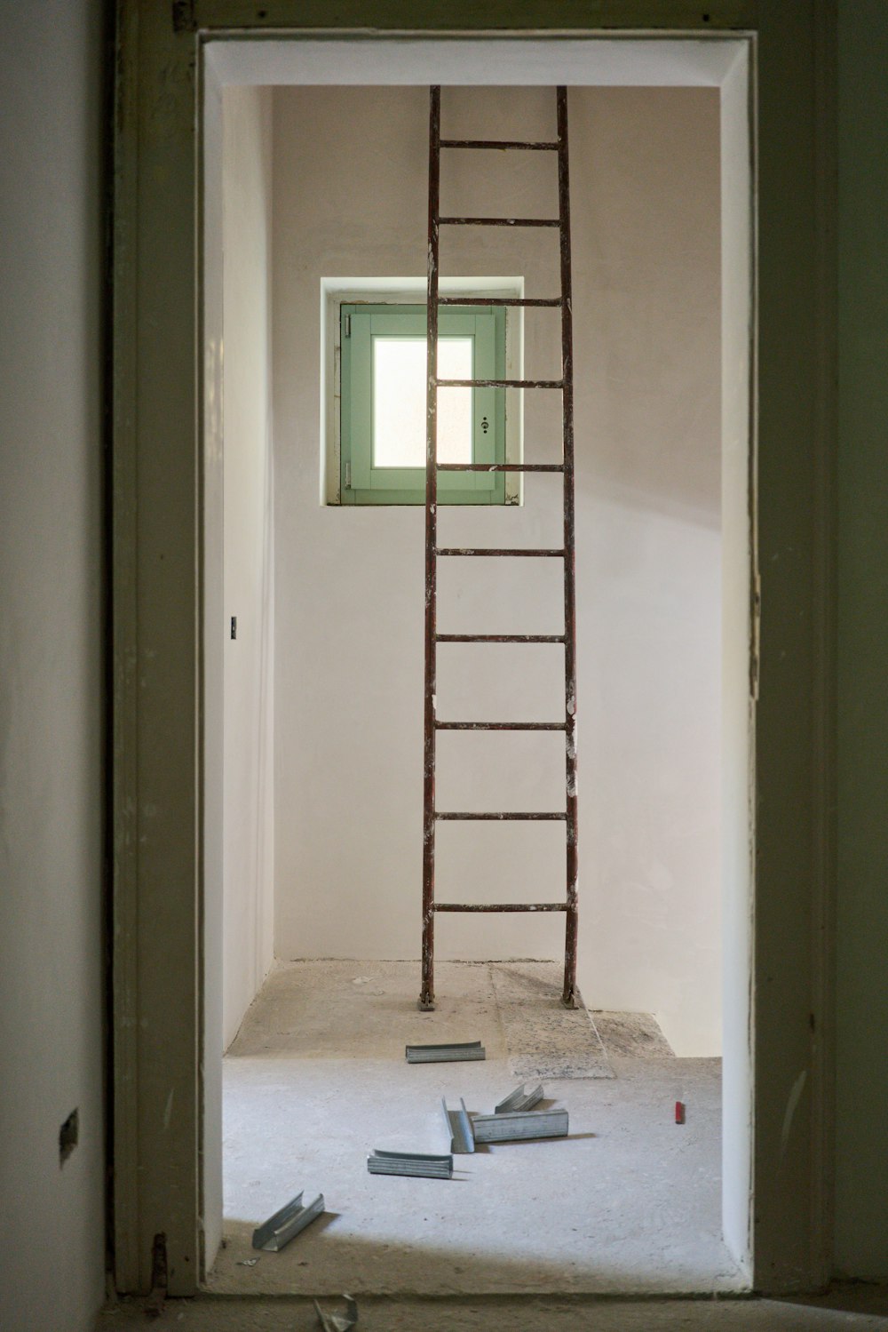 a ladder leaning up against a wall in a room