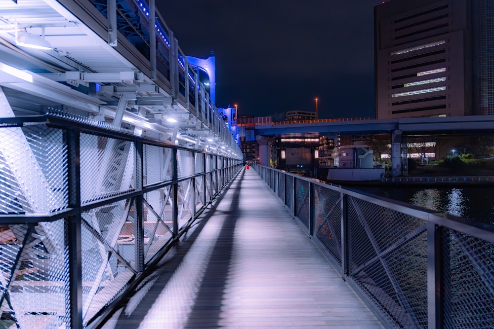 a walkway that is next to a body of water