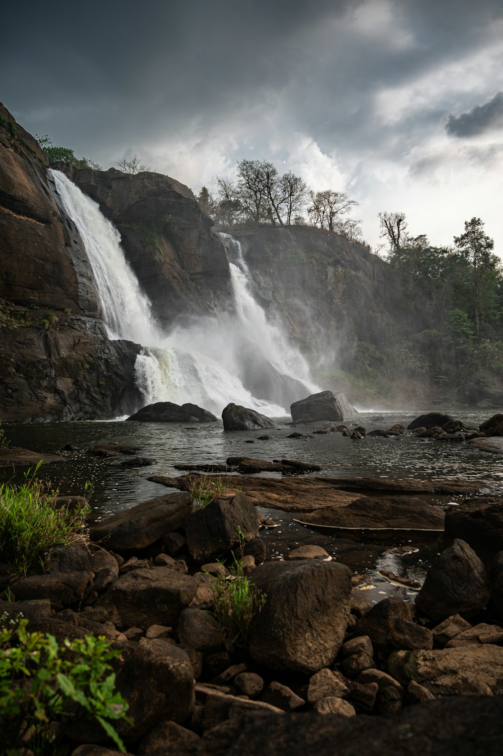 a waterfall with a large amount of water coming out of it