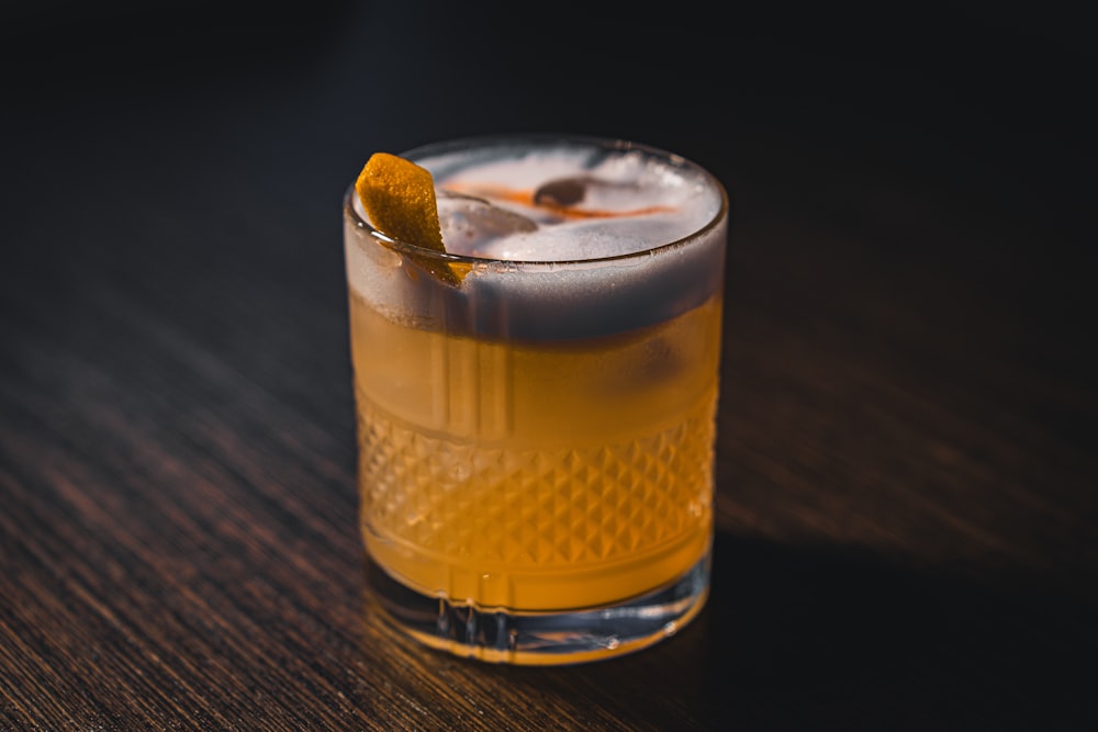 a close up of a drink on a table