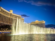 a view of the fountains in front of the las vegas hotel and casino