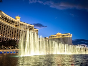 a view of the fountains in front of the las vegas hotel and casino