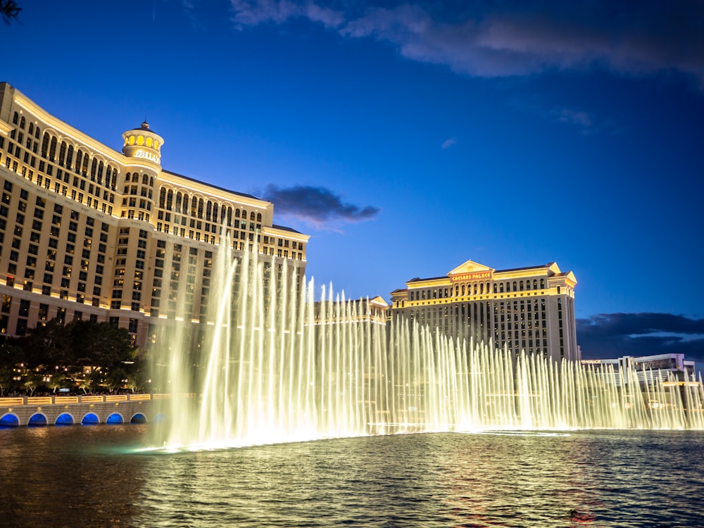 a view of the fountains in front of the las vegas hotel and casino