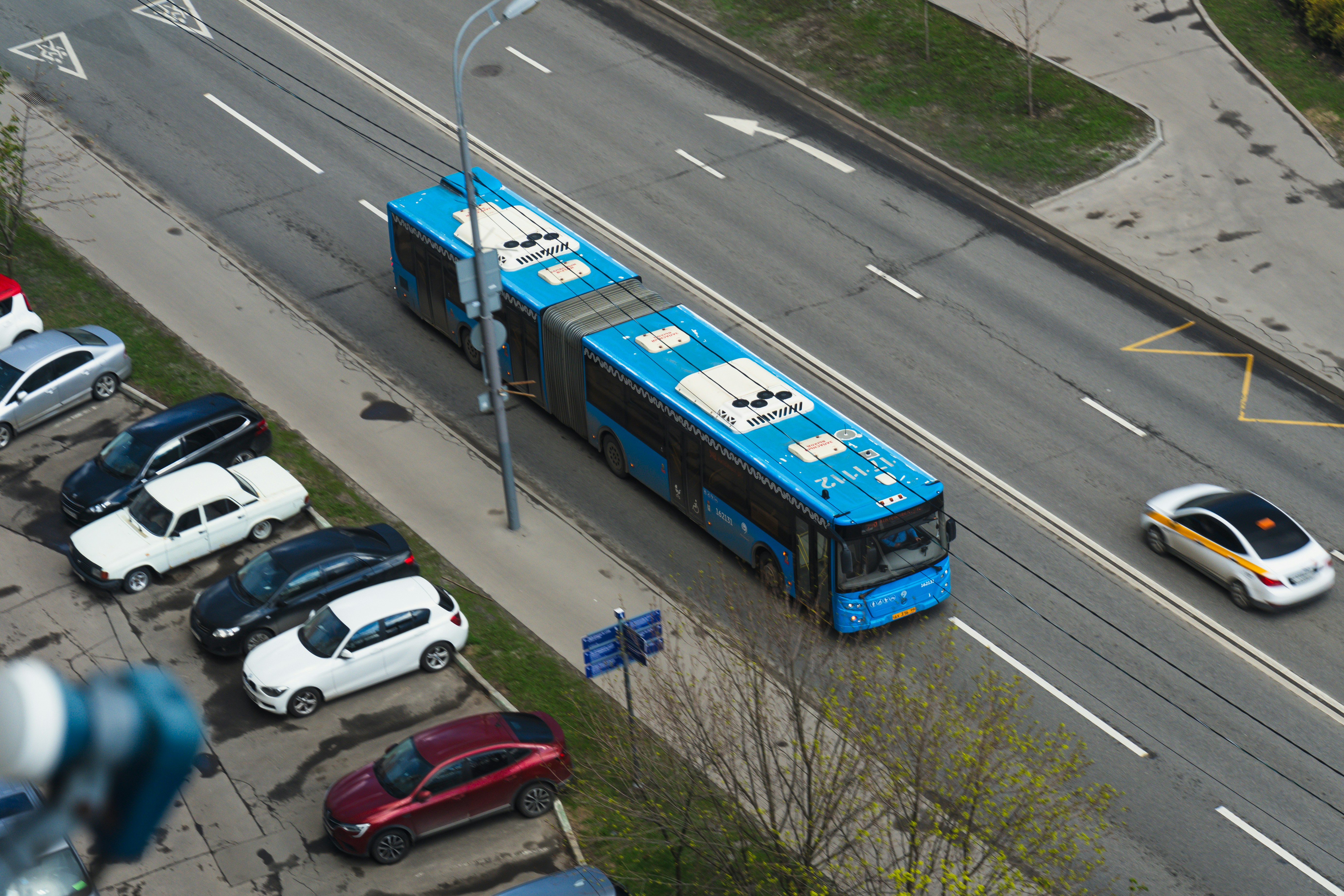 The blue Moscow ground transport bus carries passengers