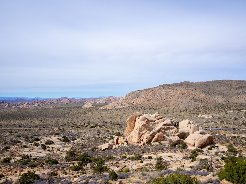 a rocky outcropping in the middle of a desert