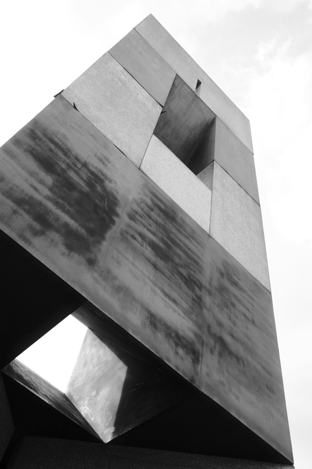 a black and white photo of a tall building