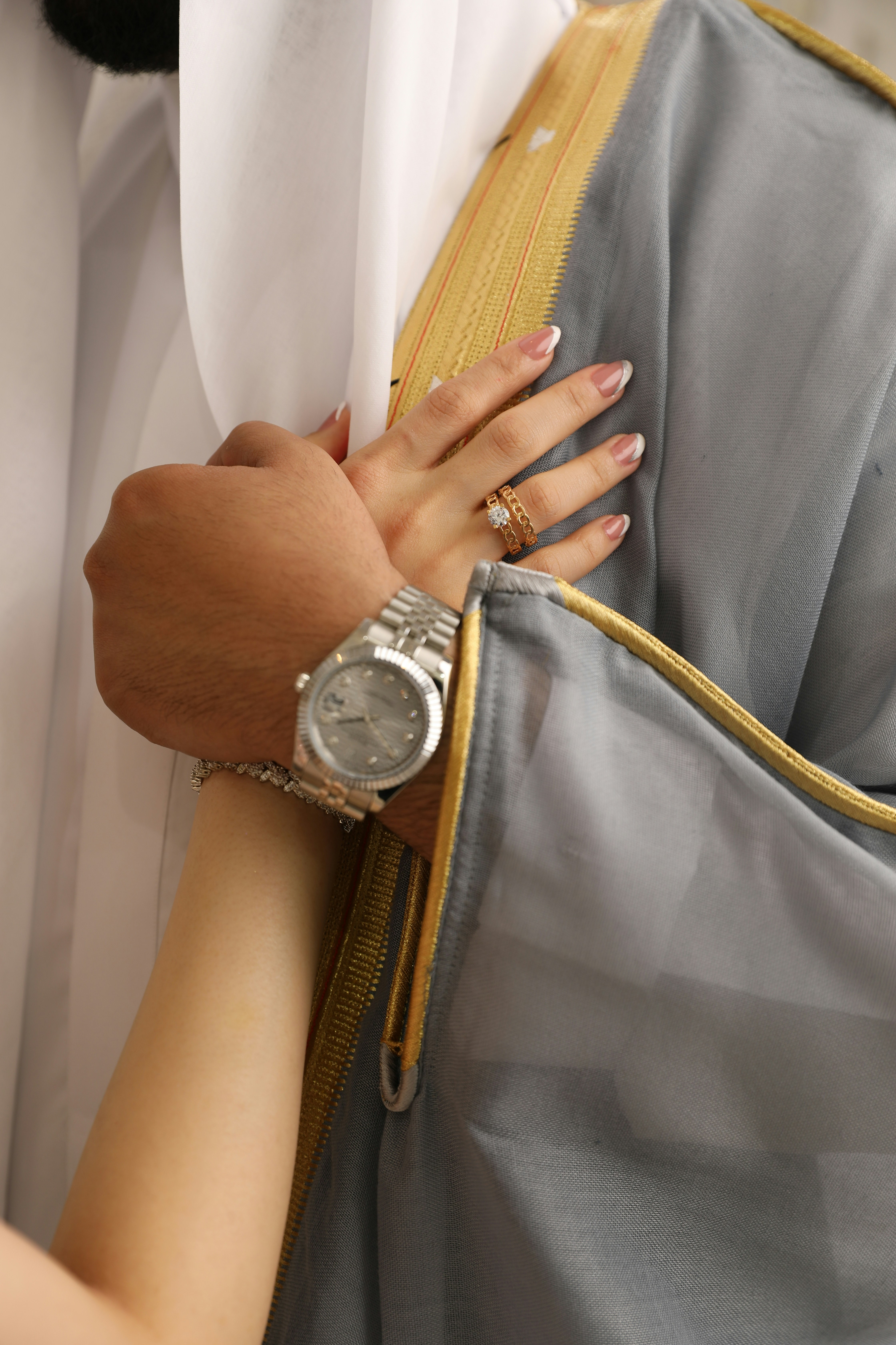 a close up of a person wearing a watch