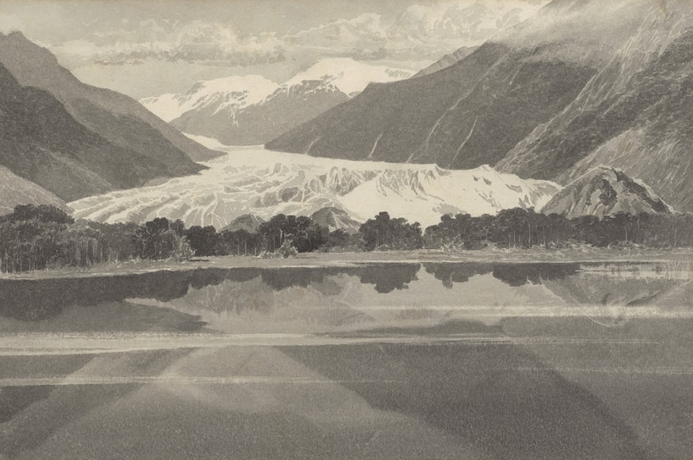 a black and white photo of mountains and a lake