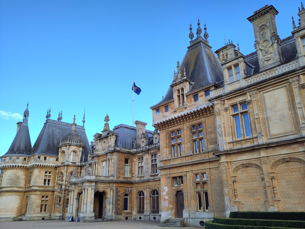 a large building with a flag on top of it