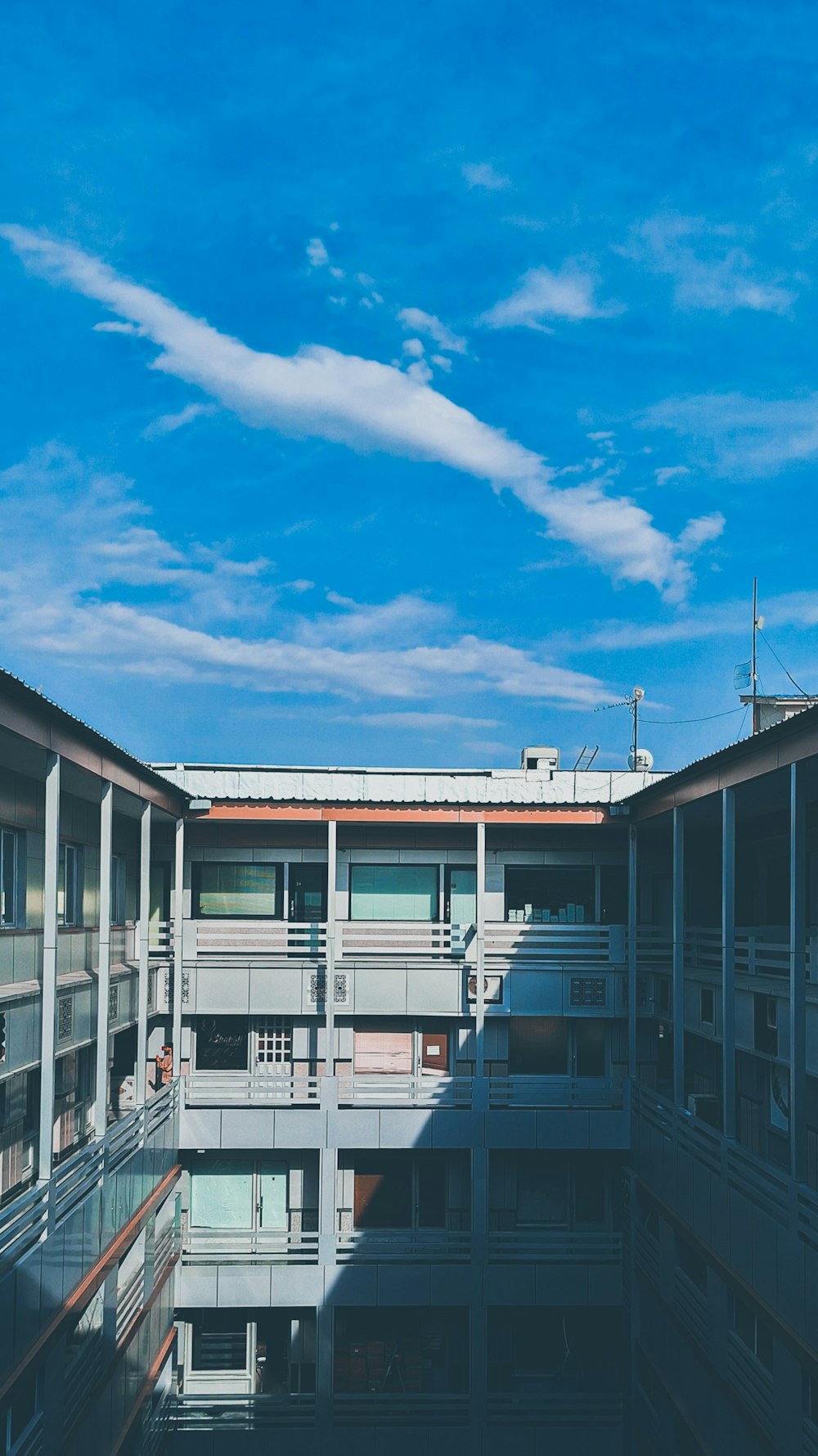 a building with balconies and balconies on top of it