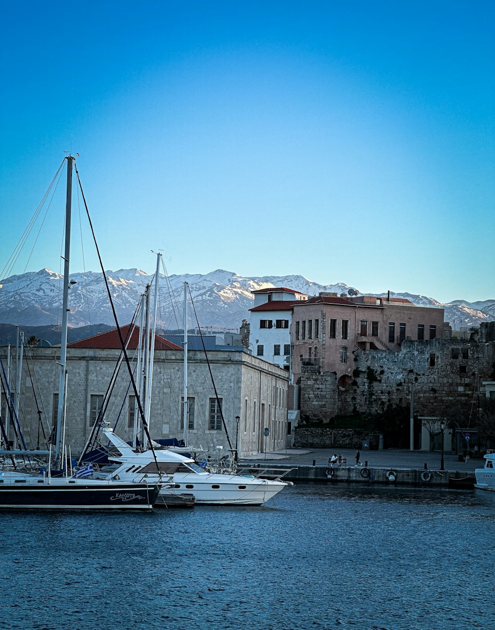 a couple of boats that are sitting in the water