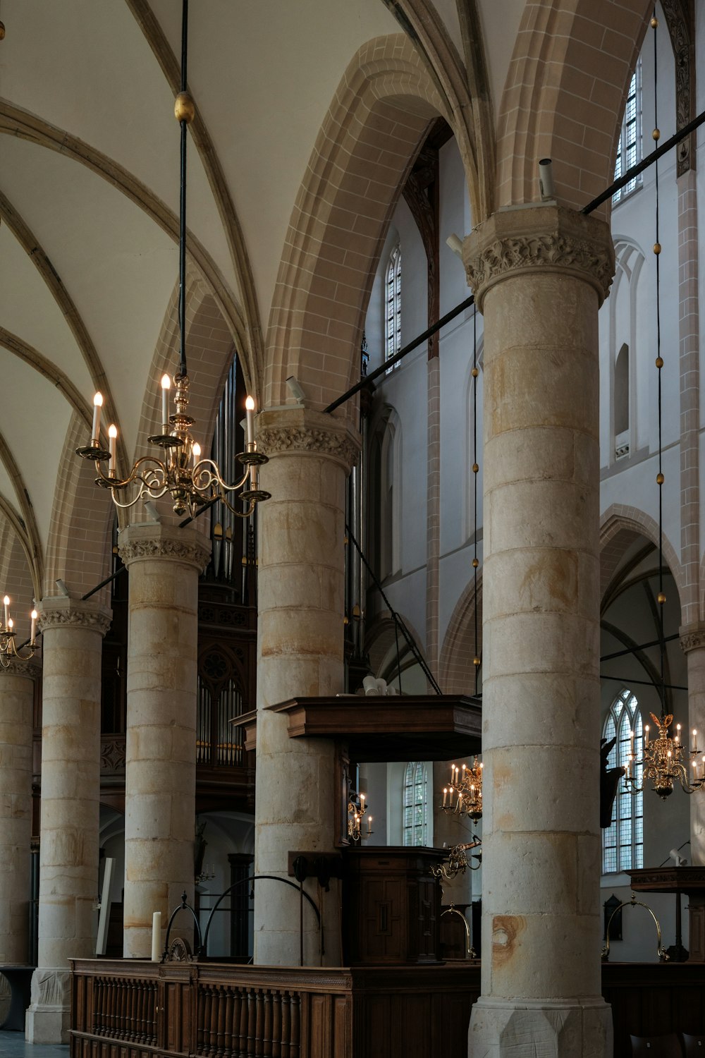 a large cathedral with a chandelier and chandelier hanging from the ceiling