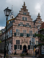 a tall brick building with lots of windows