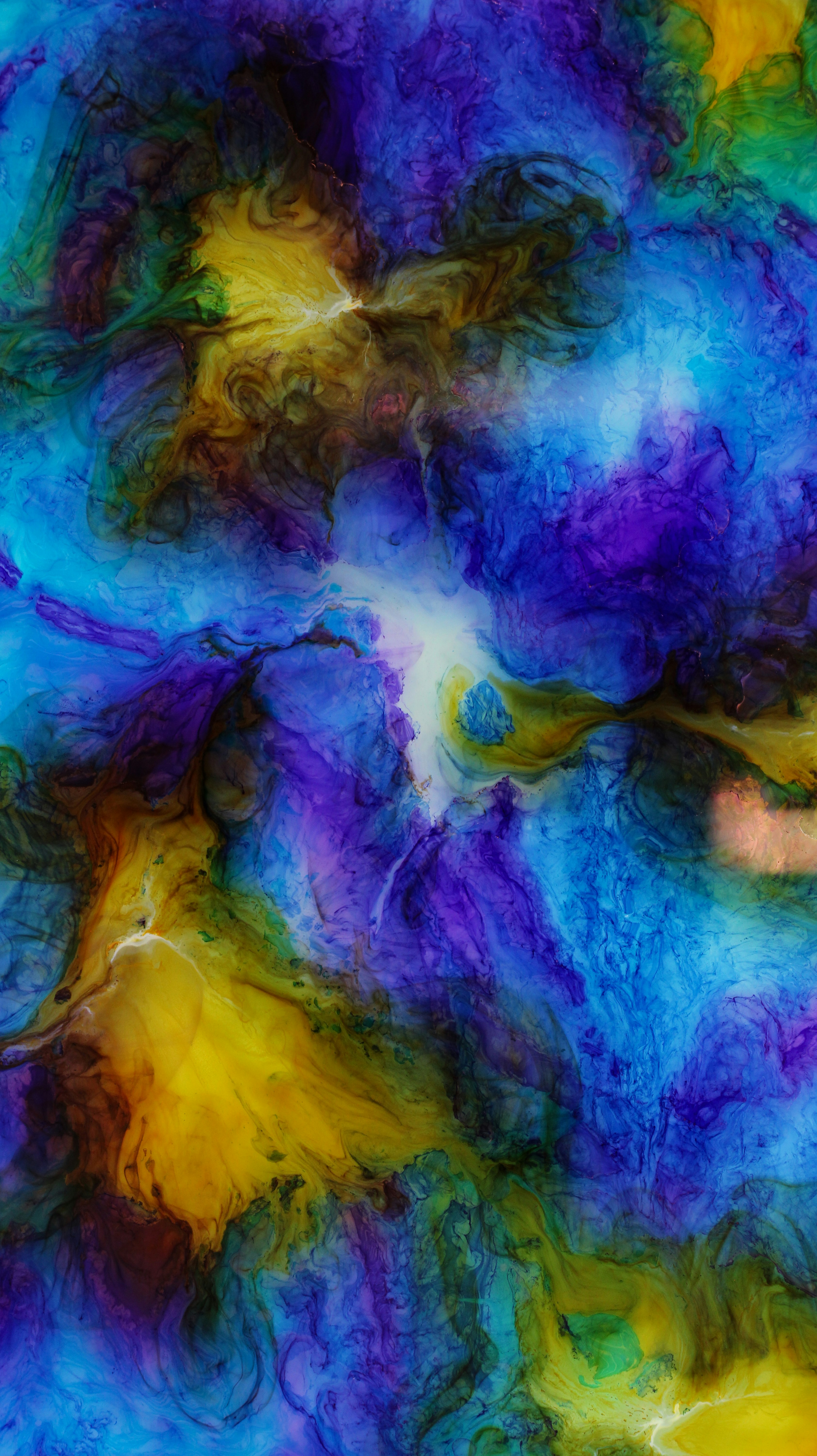 an abstract painting of blue, yellow and green colors