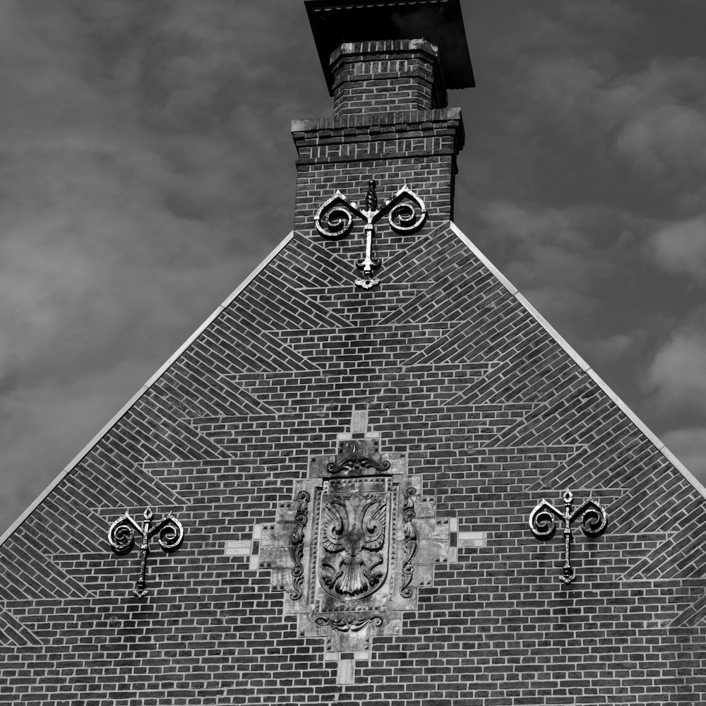 a black and white photo of a clock tower