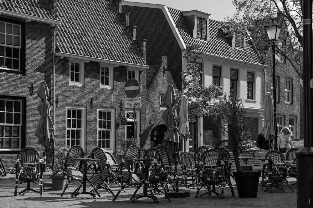 a black and white photo of a row of buildings