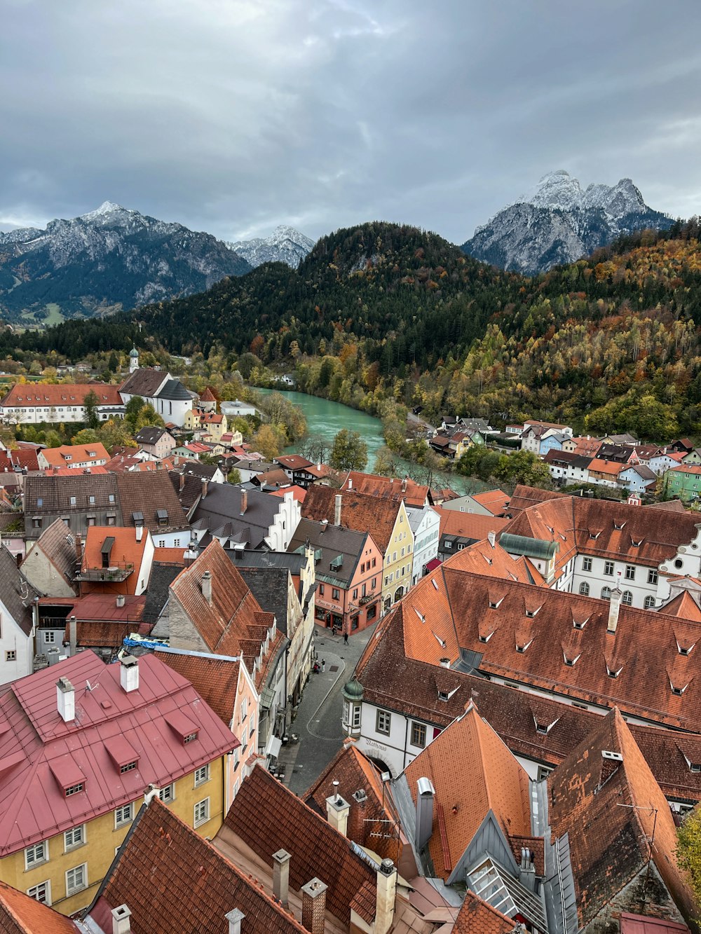 a view of a city with mountains in the background