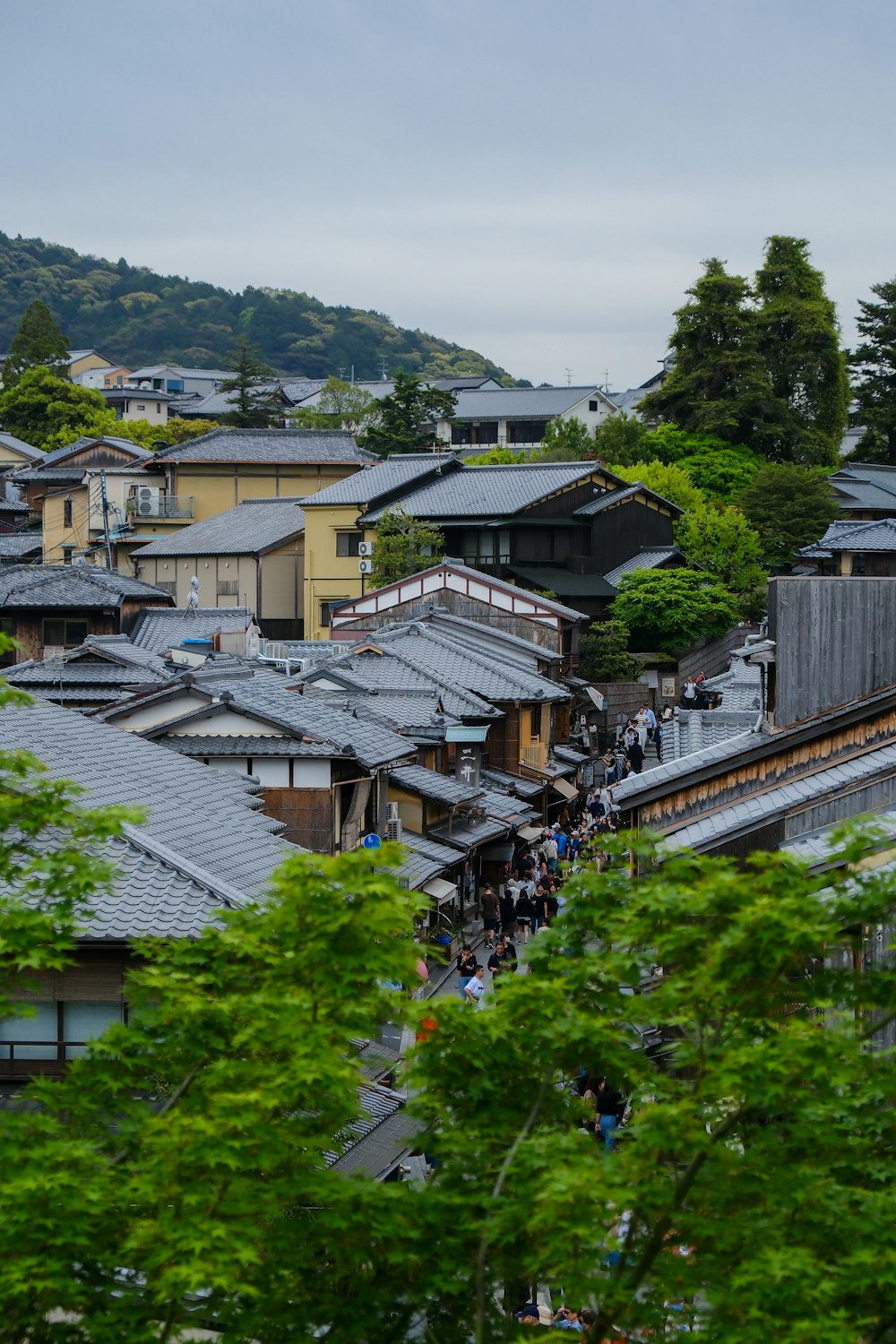 a group of people standing on top of a roof