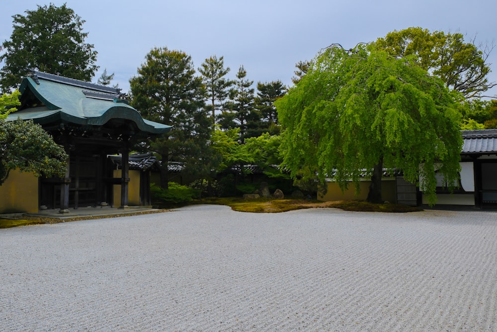 a building with a green tree in the middle of it