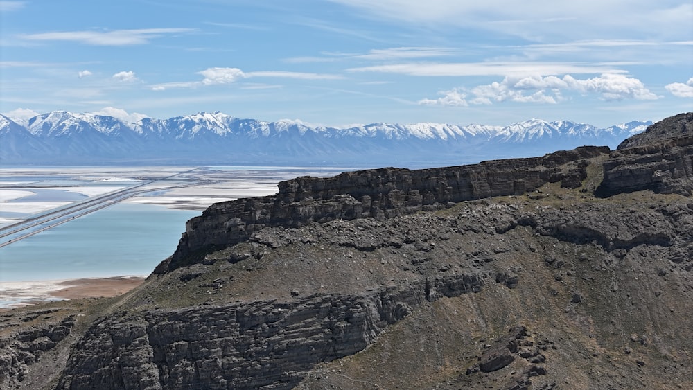 a view of a mountain range with a river running through it