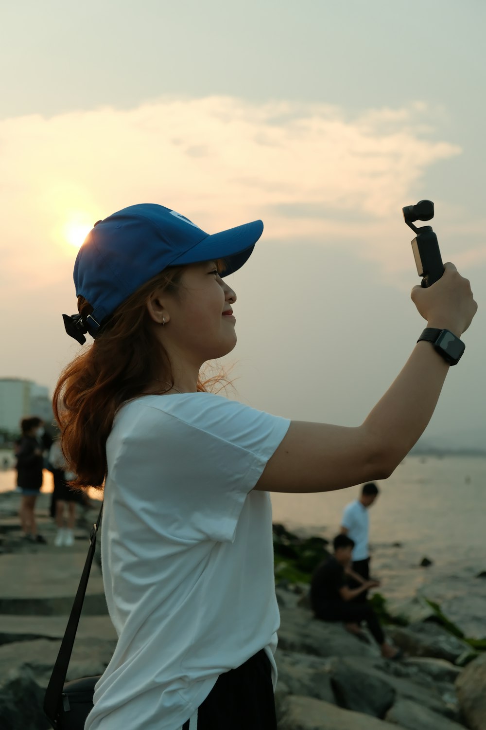 a woman taking a picture with her cell phone