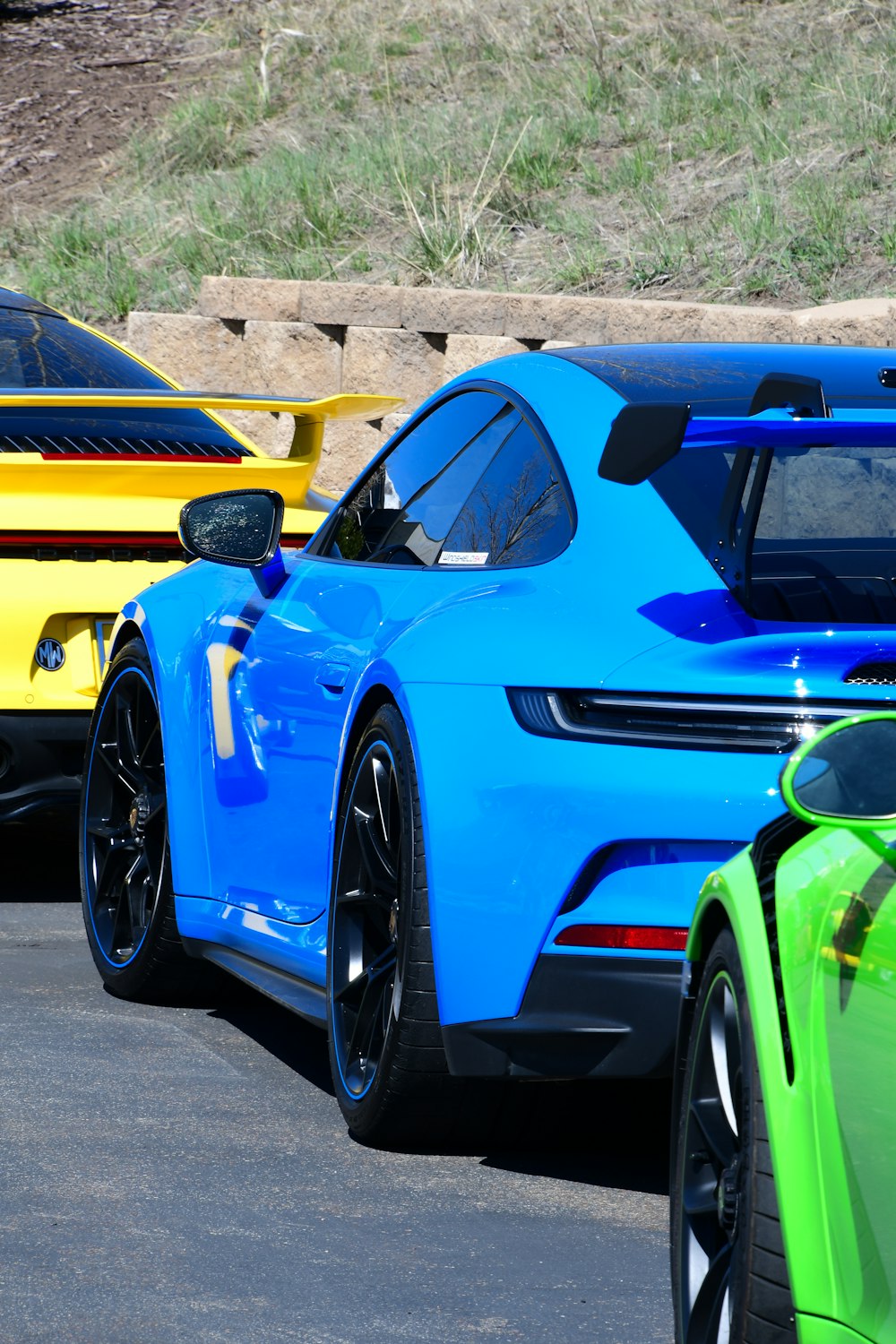 a couple of cars that are sitting in the street