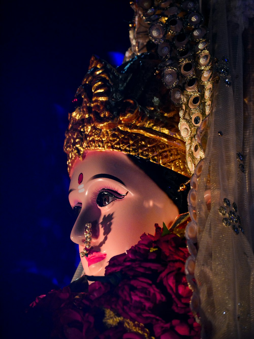 a close up of a person wearing a mask