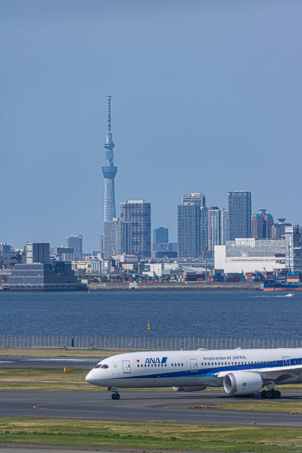 a large jetliner sitting on top of an airport runway