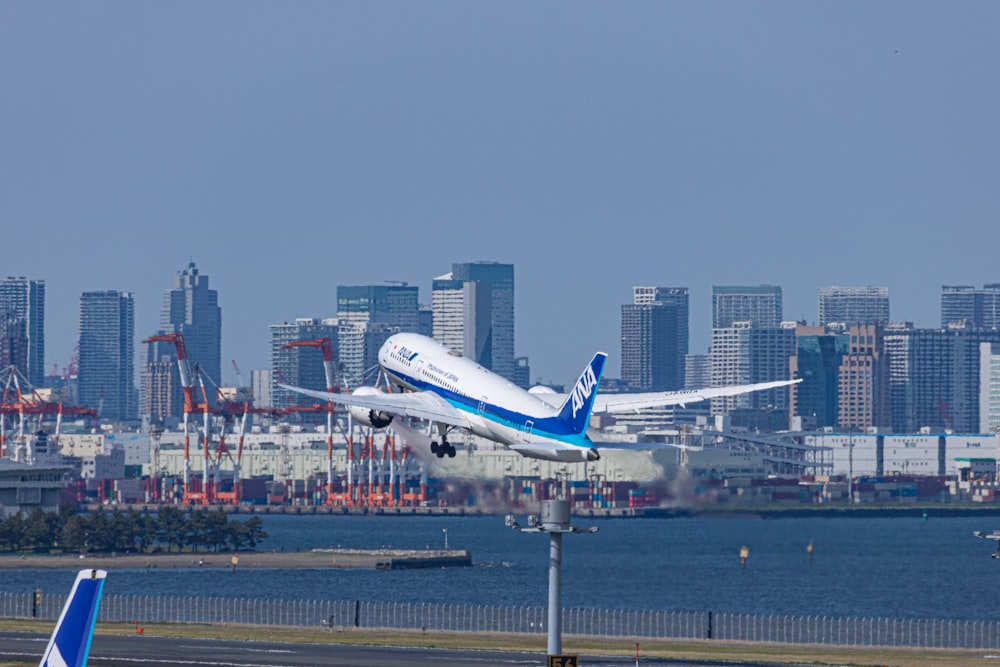 an airplane taking off from an airport runway