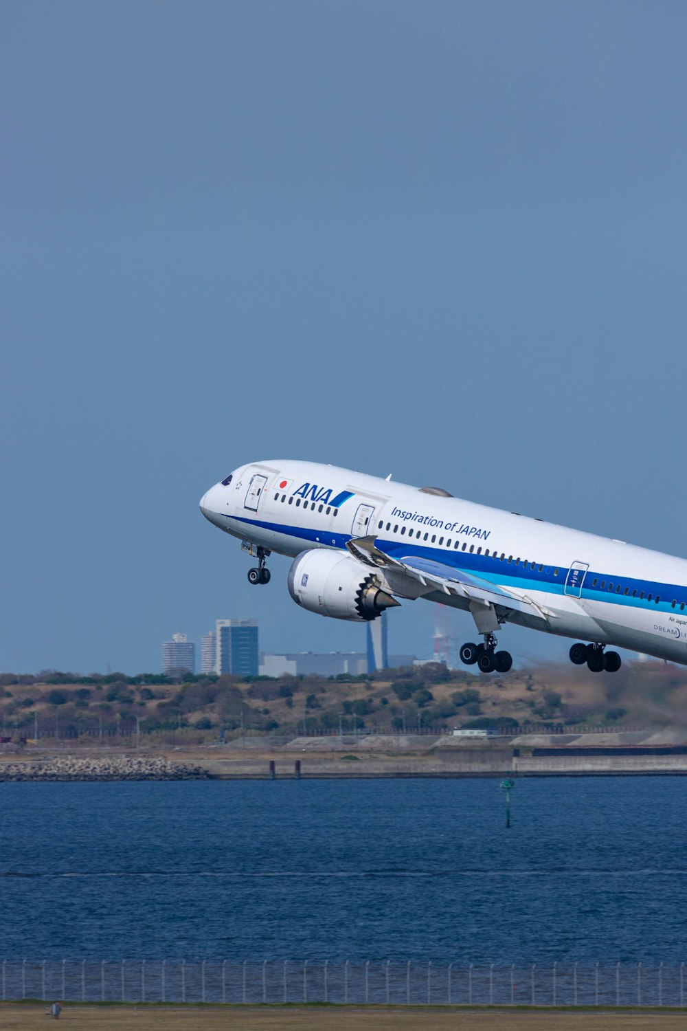 a large jetliner taking off from an airport runway