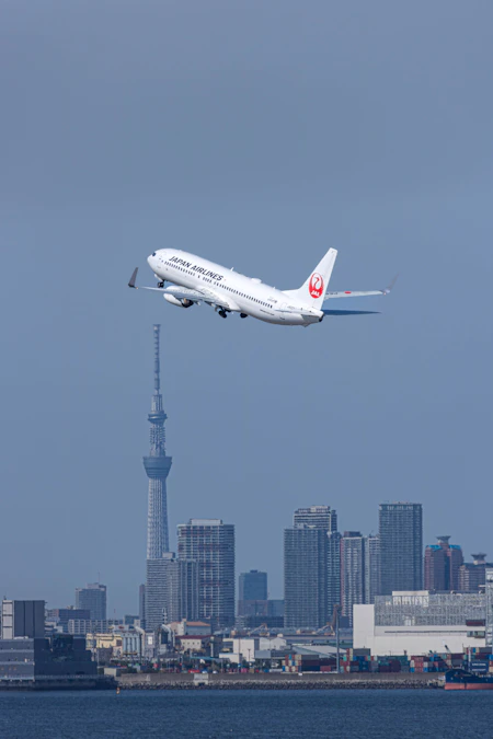 Japan Airlines A350-1000 flying over Tokyo on departure from Haneda Airport