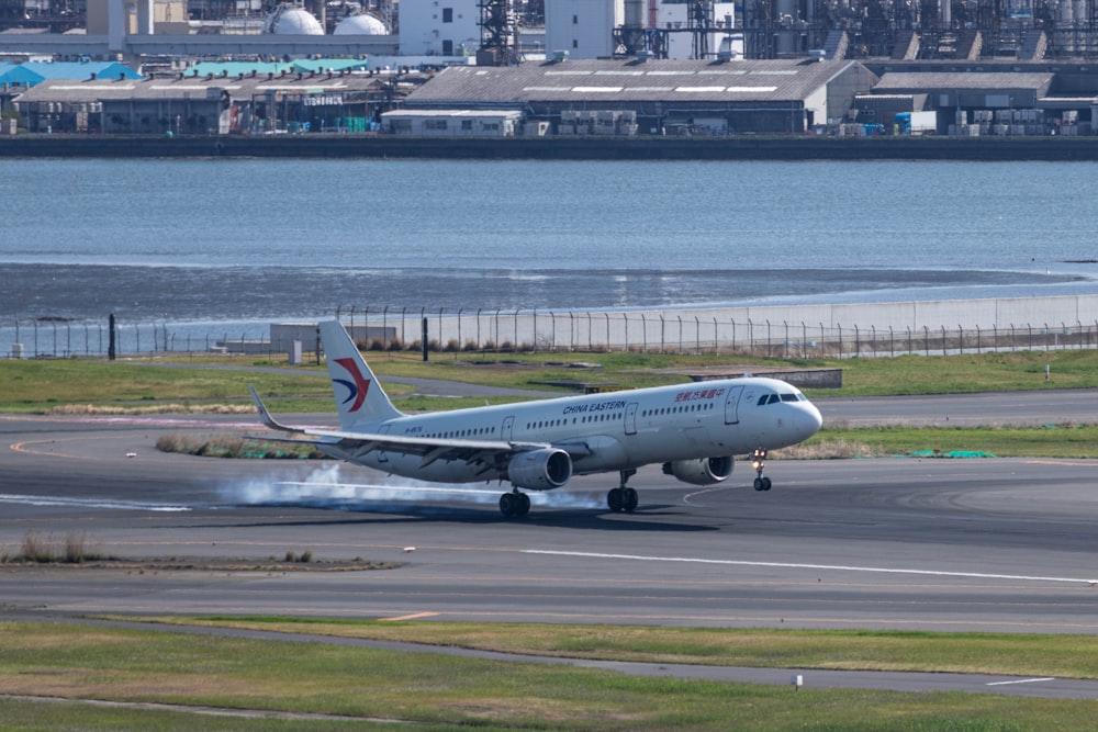 a large jetliner taking off from an airport runway