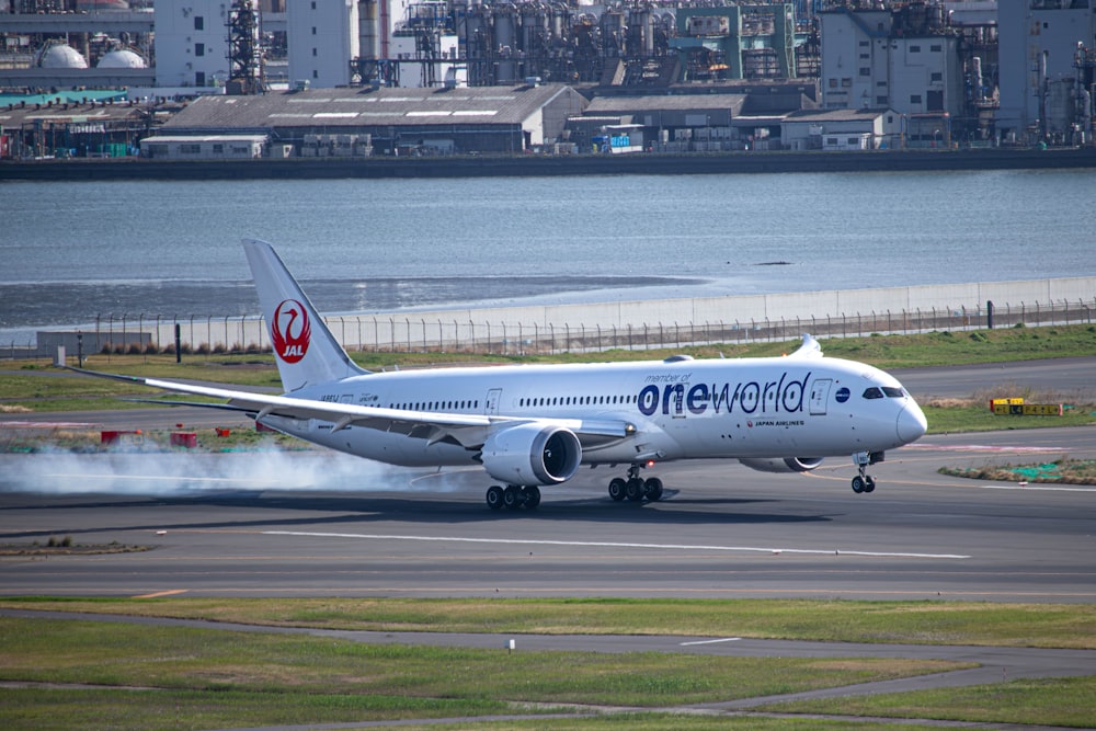 a large jetliner taking off from an airport runway