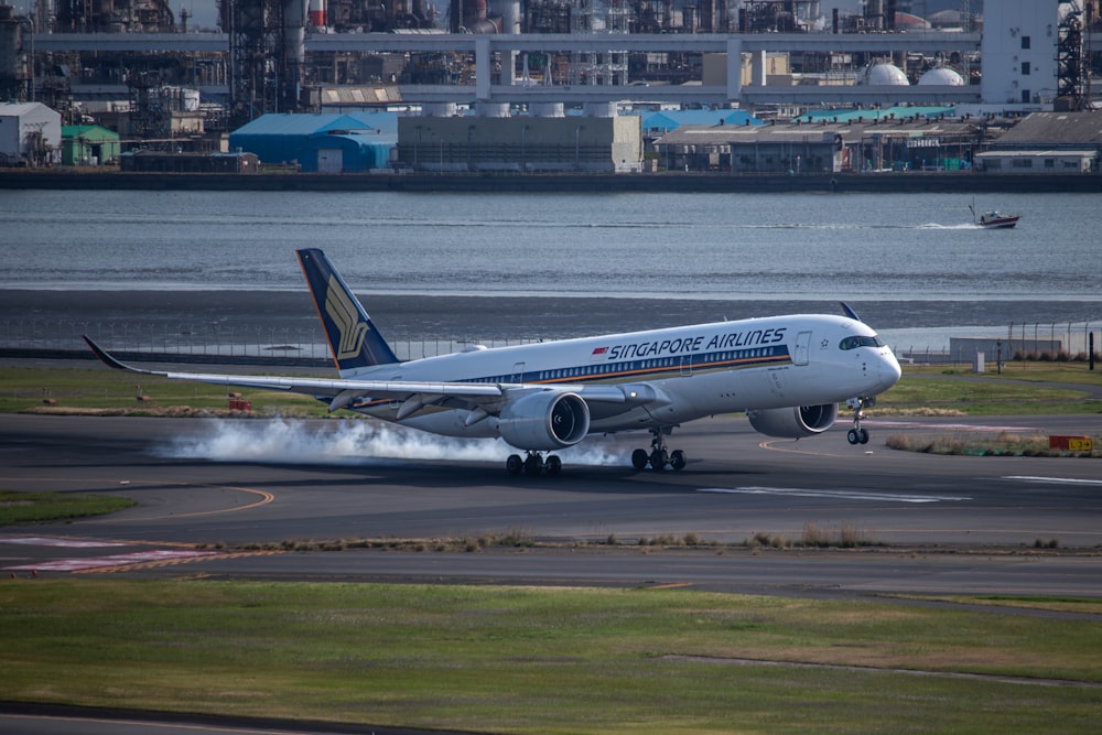 a large jetliner taking off from an airport runway