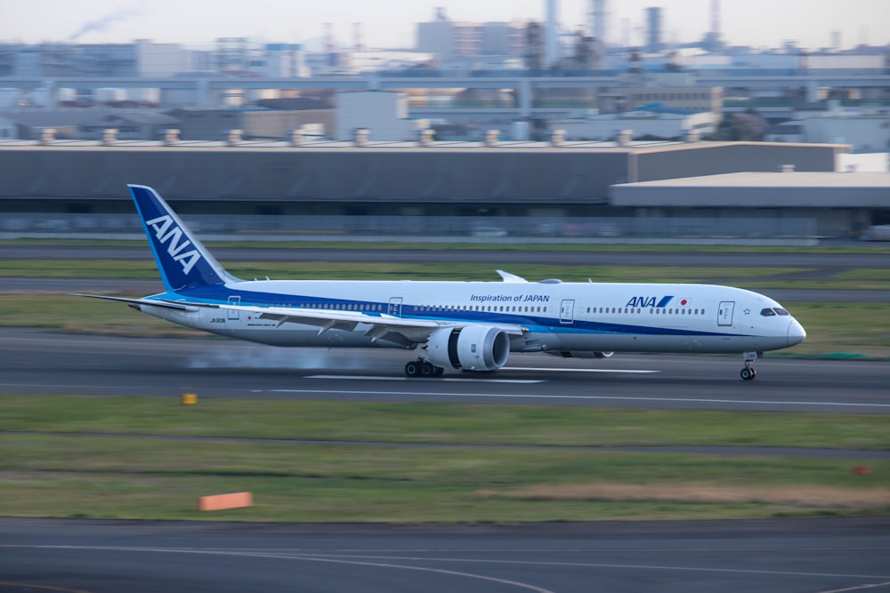 a large jetliner taking off from an airport runway