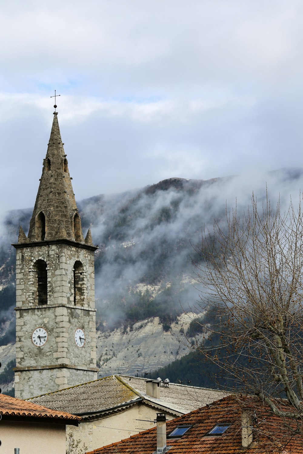 a church steeple with a clock on it