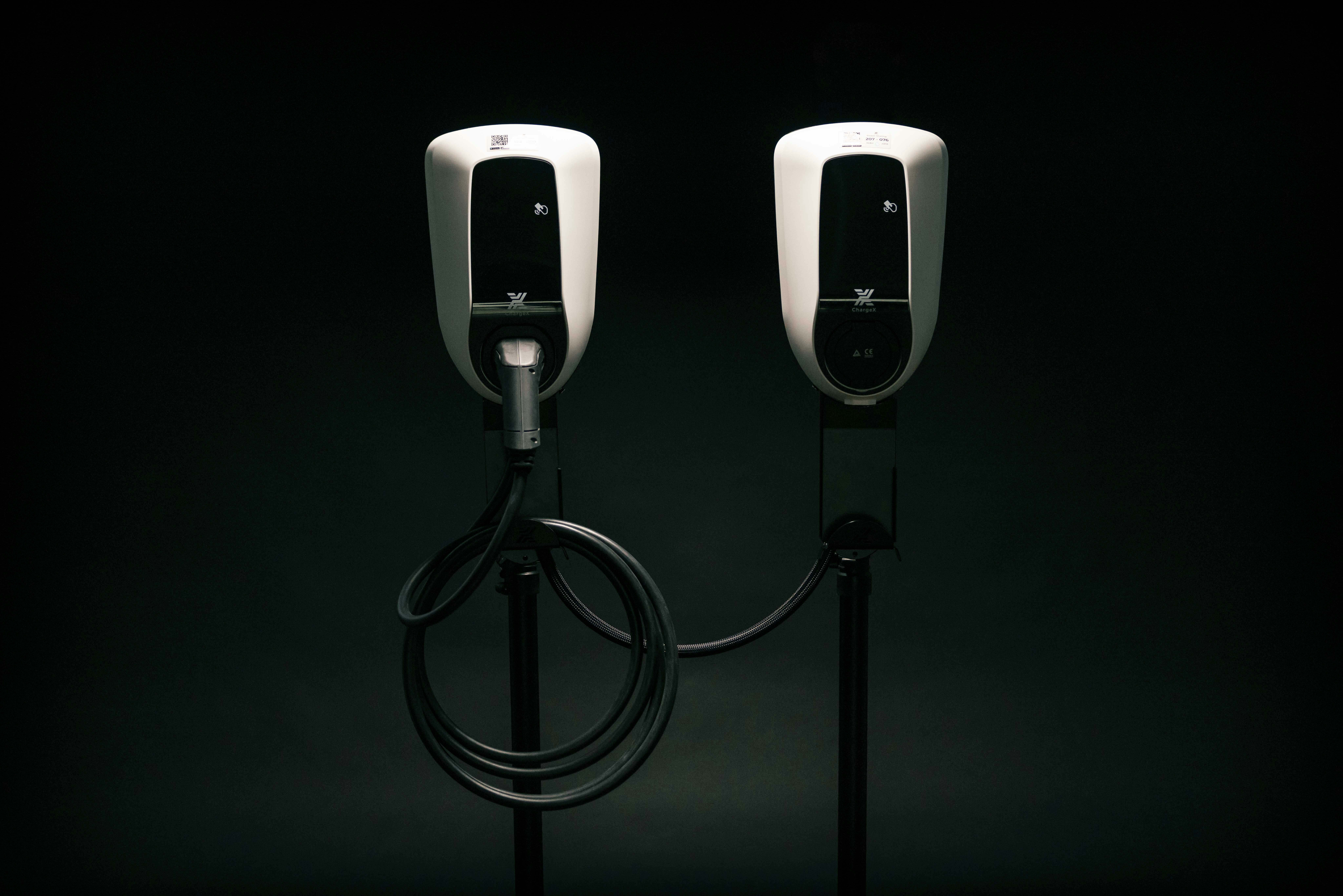 Interior of a modern three-row electric SUV showing spacious seating and flat floor