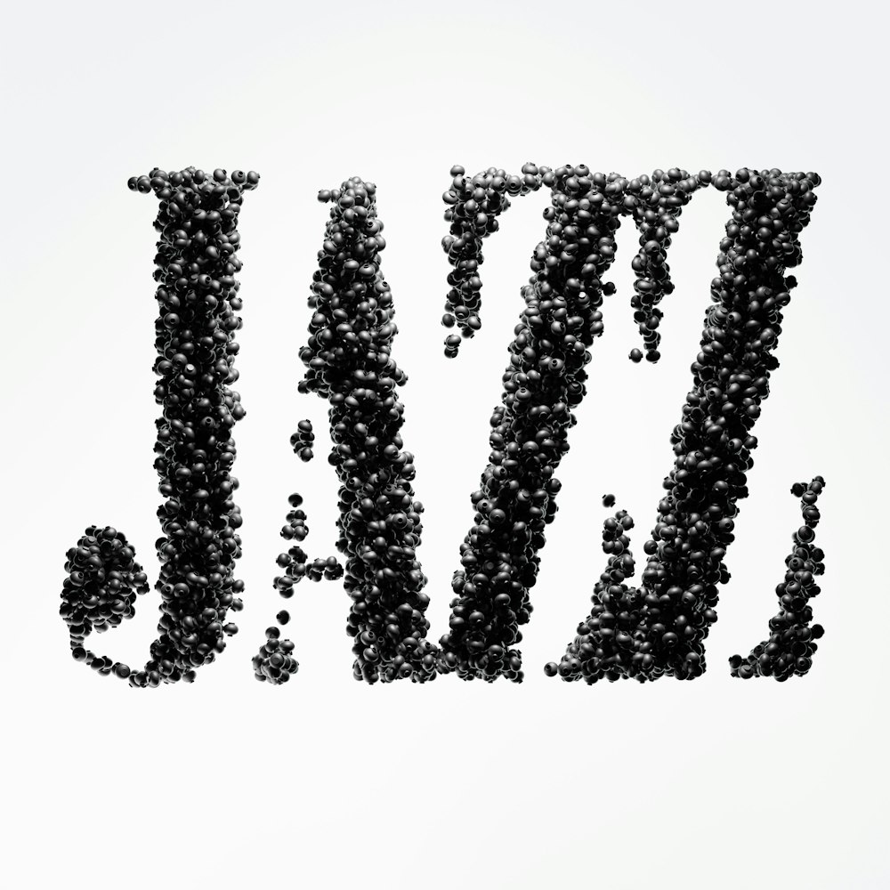 a black and white photo of the word jazz