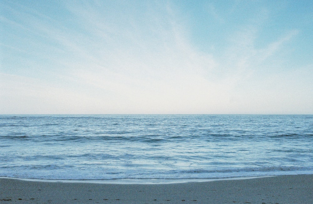 a view of the ocean from a beach