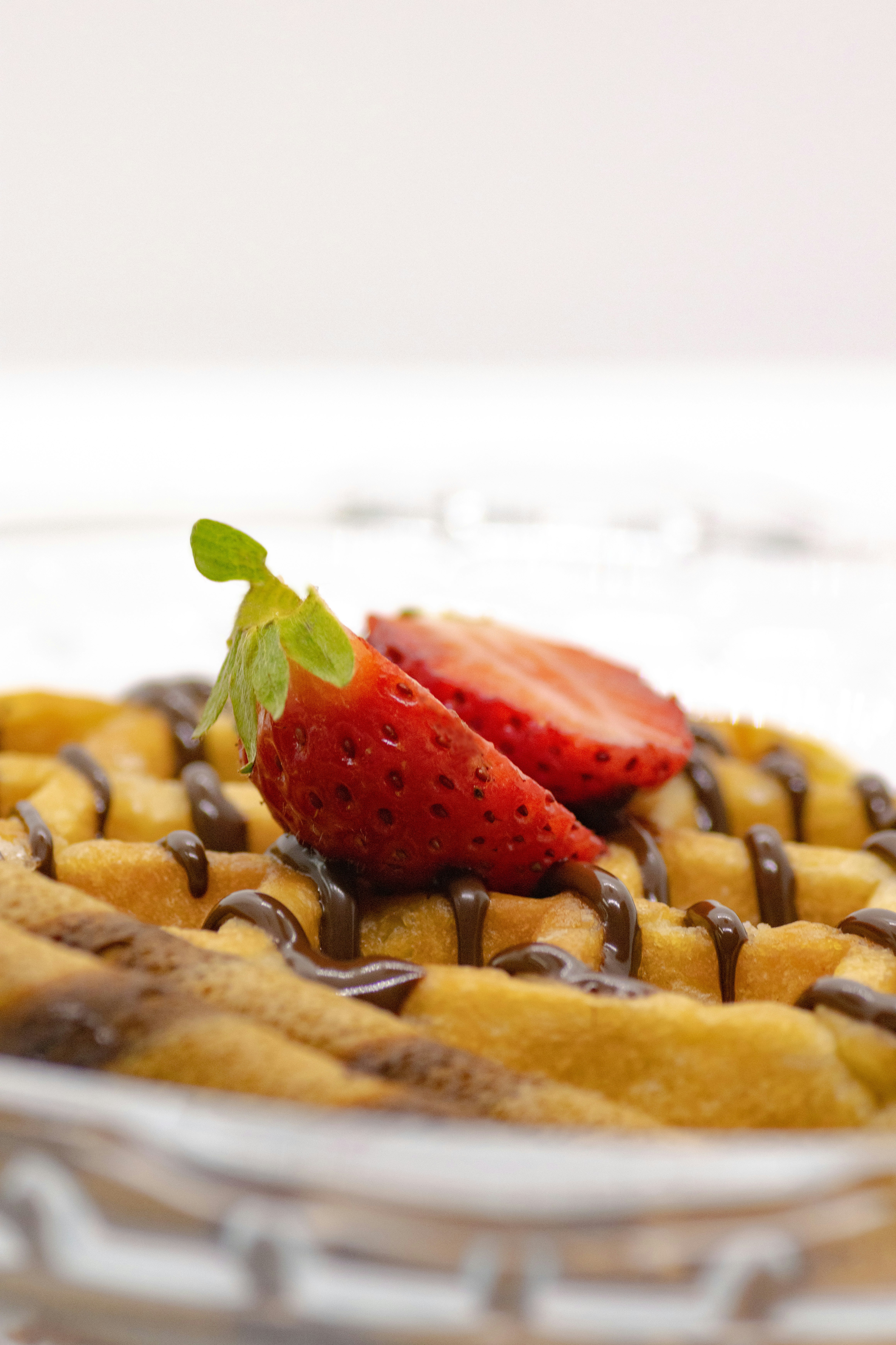 a dessert with chocolate and a strawberry on top