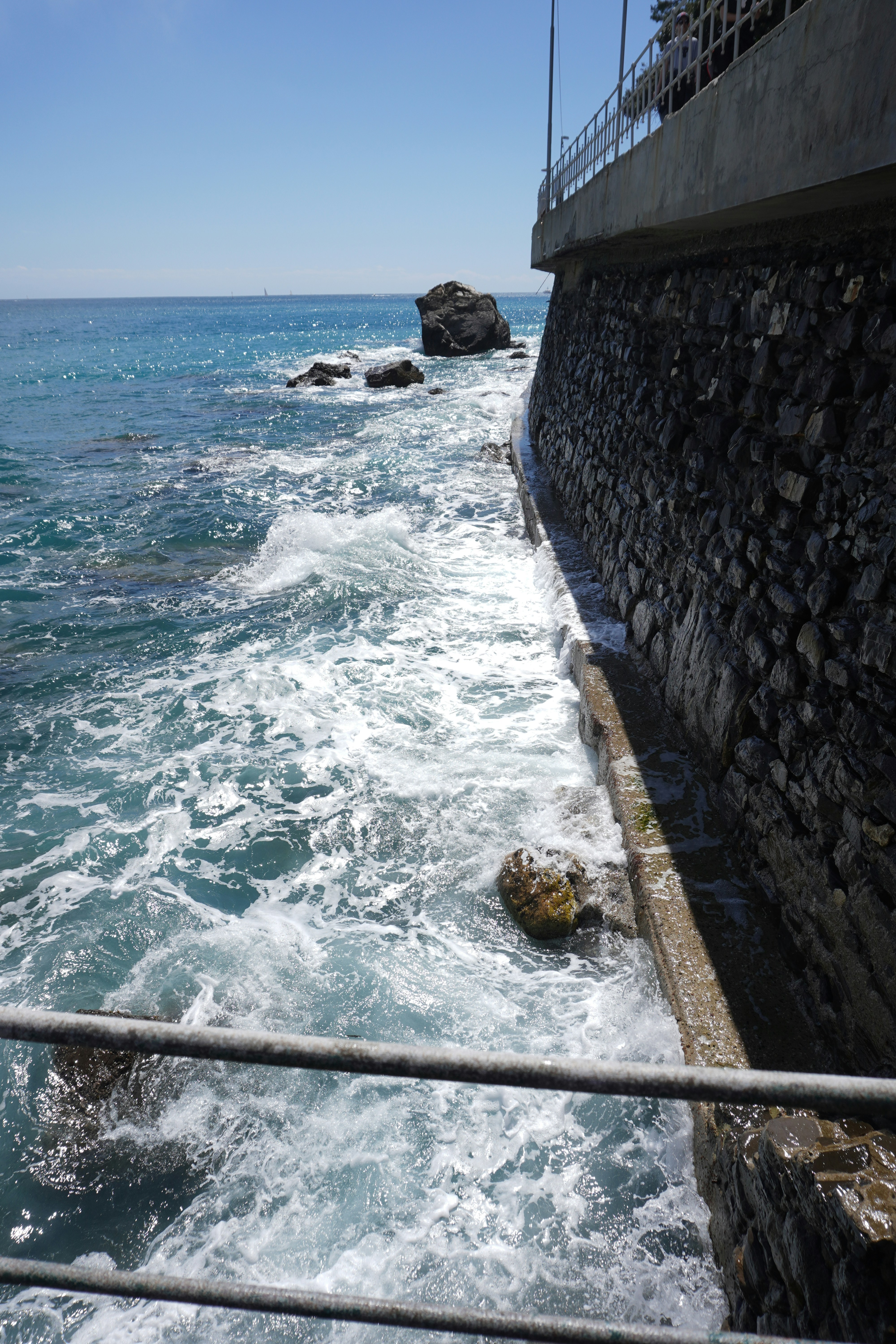 a view of a body of water from a bridge
