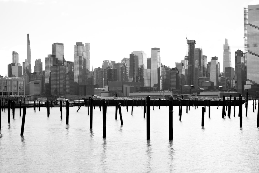 a large body of water with a city in the background