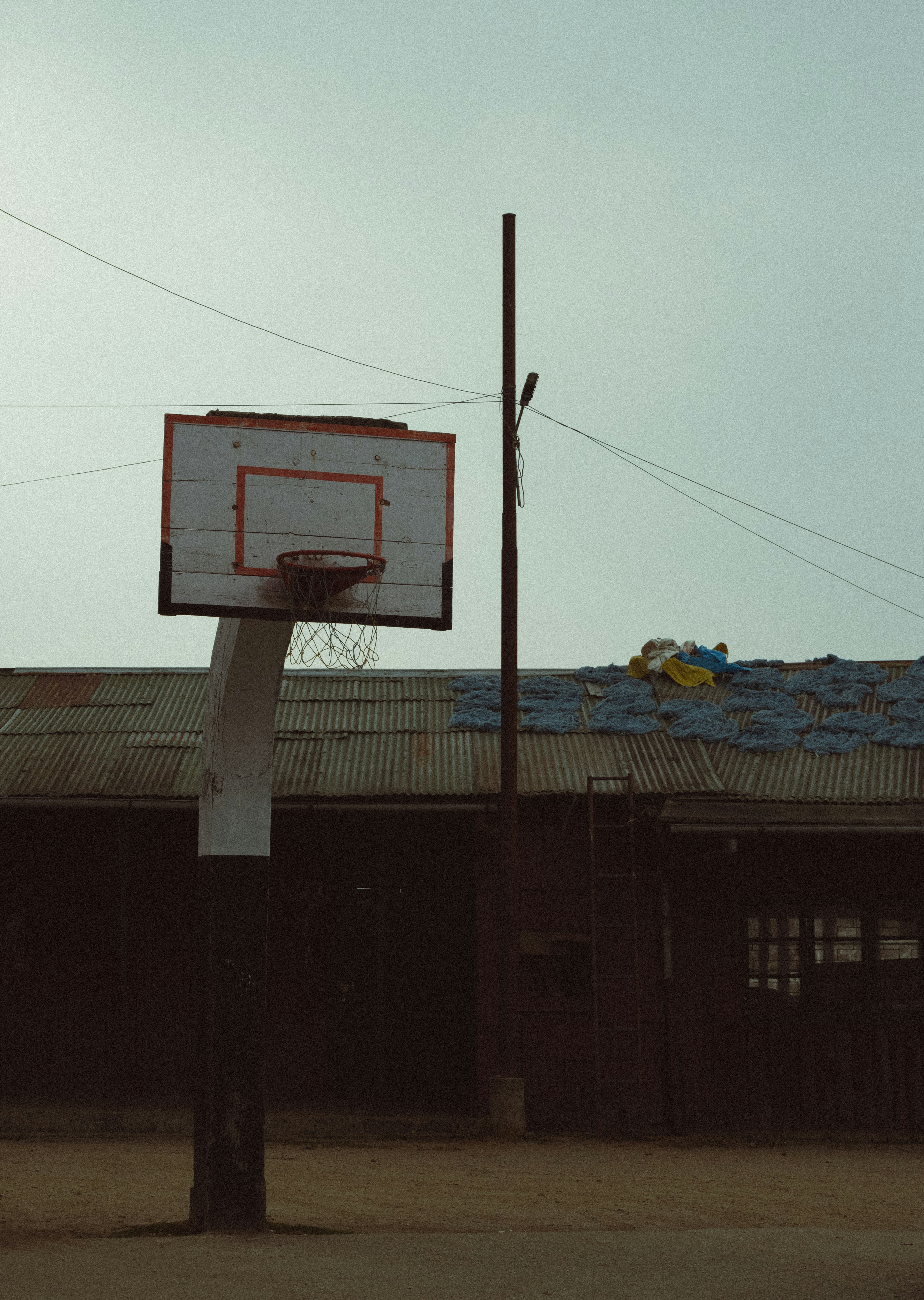 a basketball hoop in front of a building