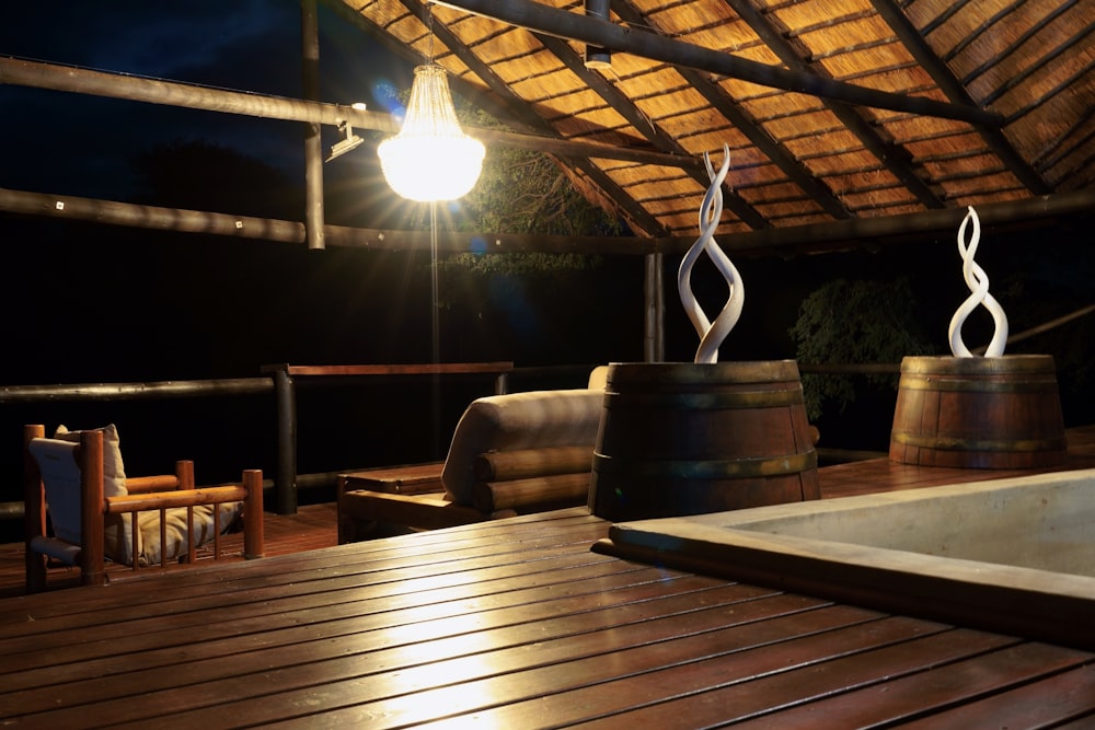 a hot tub sitting on top of a wooden deck