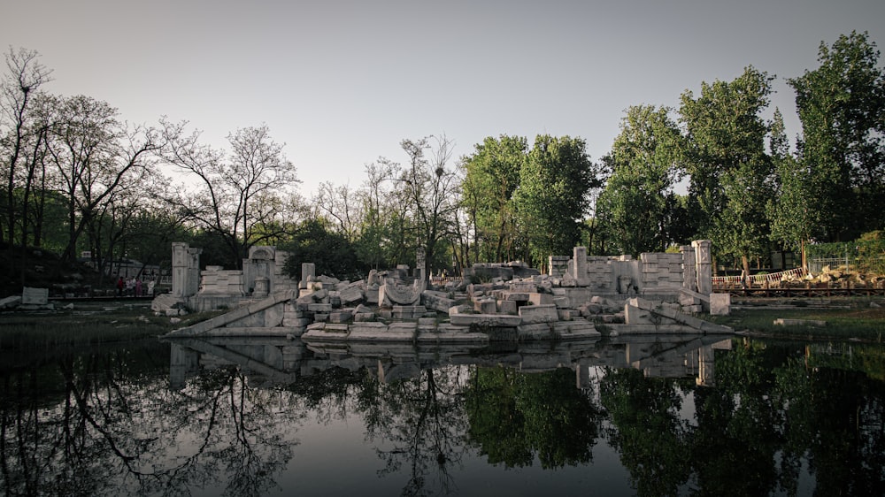 a large body of water surrounded by stone structures