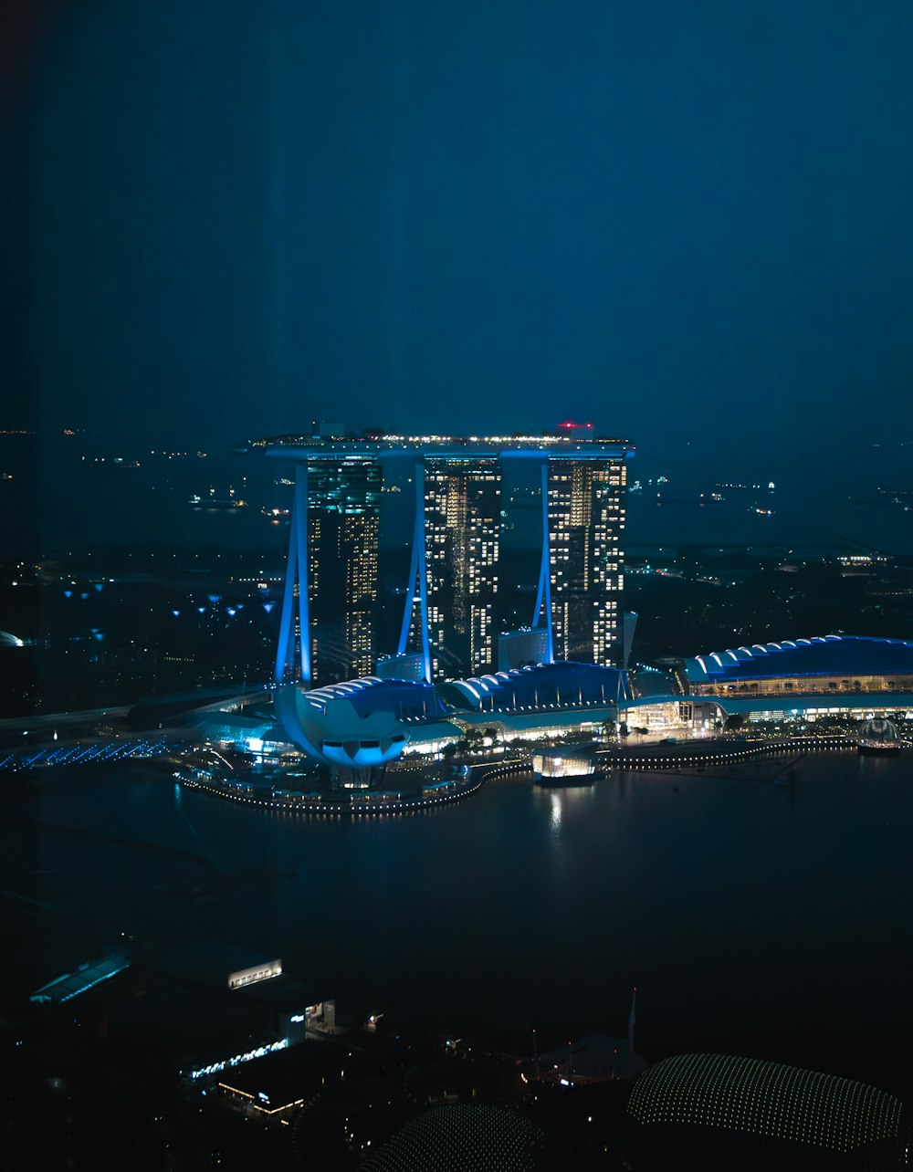 an aerial view of a city at night