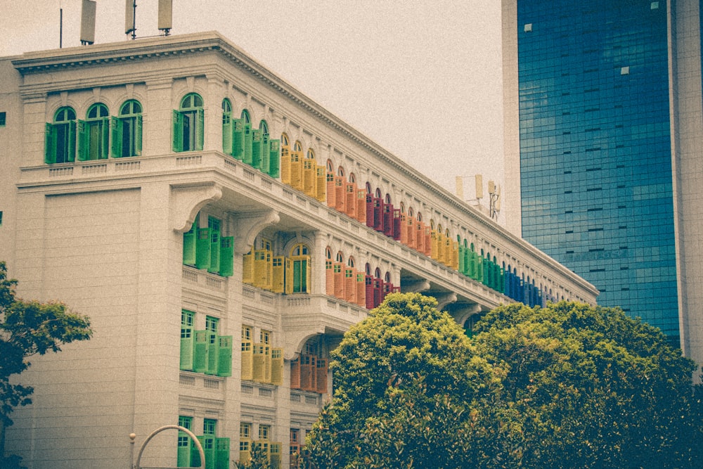 a tall building with a rainbow painted on it