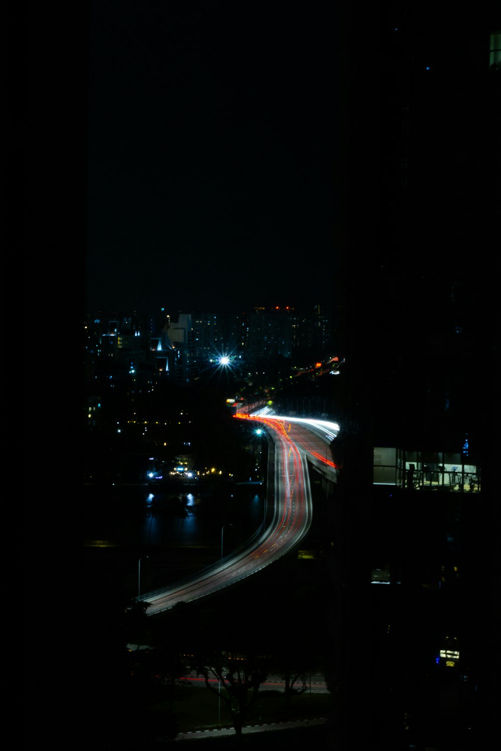 a long exposure photo of a city at night