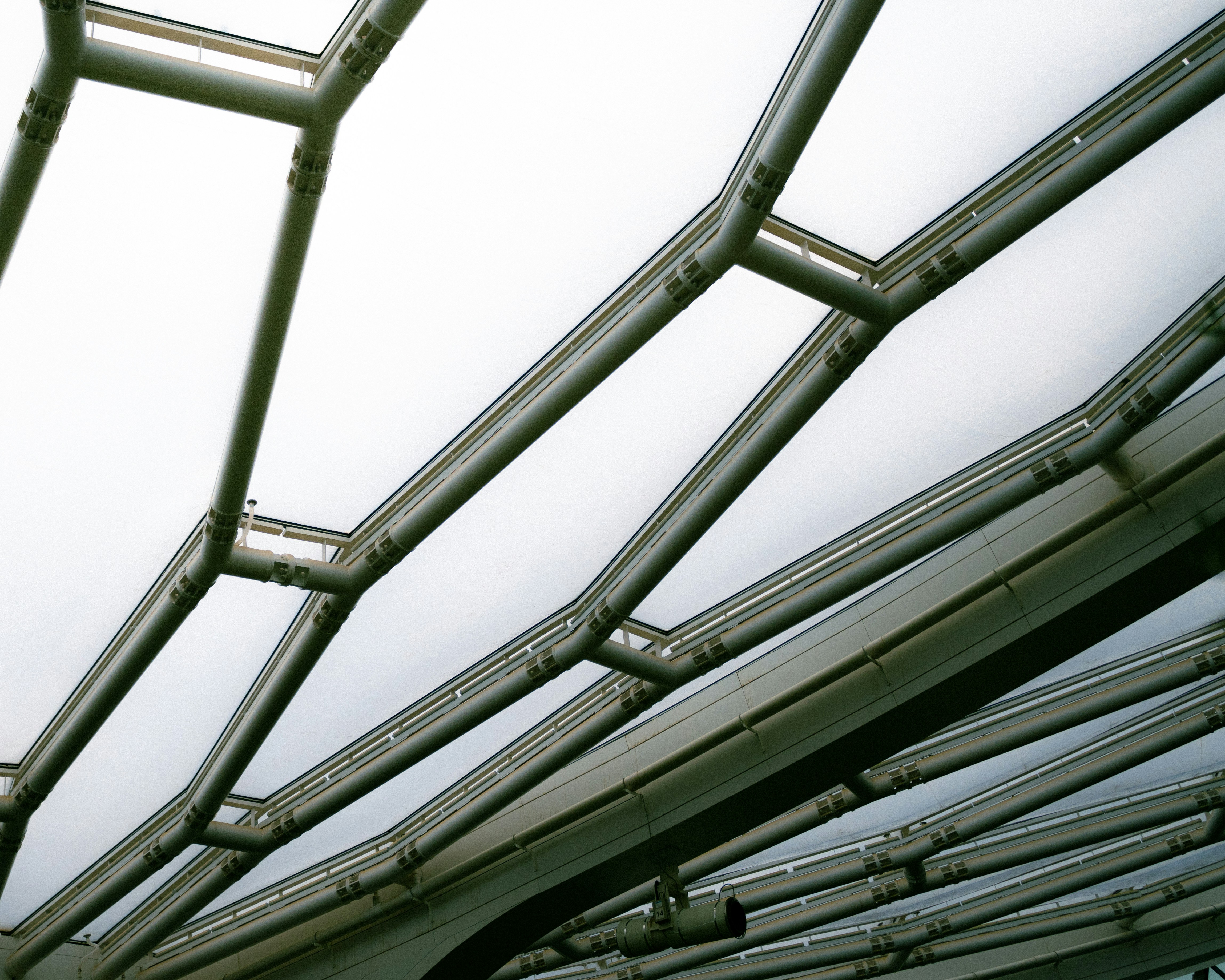 a view of a roof made of metal pipes
